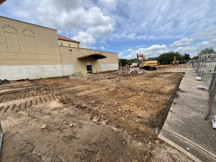 An image of early construction where the FUMC porte cochere will be located, looking northwest